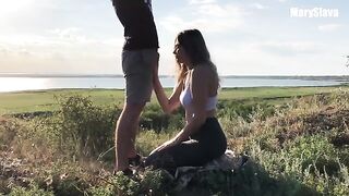 A girl is having fun with her boyfriend outdoors, testing their bodies