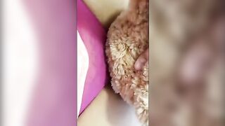 A girl is fucking with a teddy bear instead of a guy