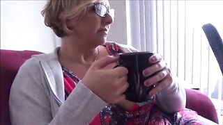 The step mom, a stunning blonde bombshell, awaits her stepson’s return home