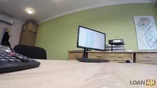 A woman needs a loan for her business, she is interviewed by a loan agent