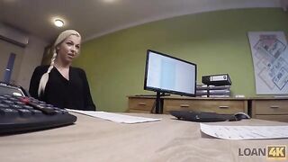 A woman needs a loan for her business, she is interviewed by a loan agent