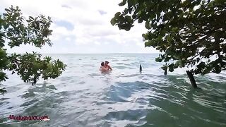 A couple enjoys amazing sex in the crystal clear waters of a famous lagoon