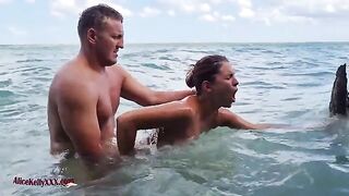 A couple enjoys amazing sex in the crystal clear waters of a famous lagoon