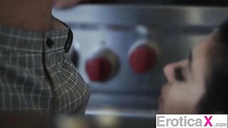 The couple has a hot sex in the kitchen, passionate and sensual
