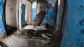 A girl is walking around horrible buildings with her sexy babe