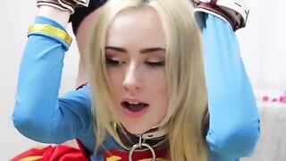 Candy White, in a sexy Supergirl costume, indulges in bondage and more