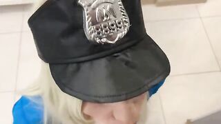 A sexy girl is dressing up as a police officer to catch a robber