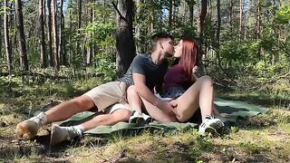 Passionate amateur couple sex on a picnic in the park