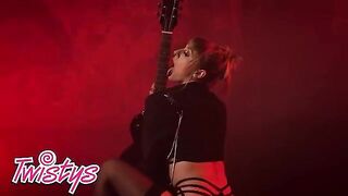 Blonde Angel Youngs in red lingerie poses with a bad ass, showcasing her huge naturals