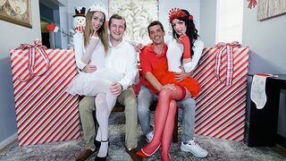Two cute stepdaughters dressed in costumes for a special holiday exchange