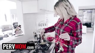 Cory Chase, the busty step mom, presents her gift to her step son in a sensual way