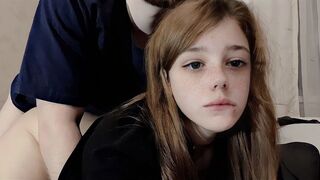 A cute girl is having fun with her roommate