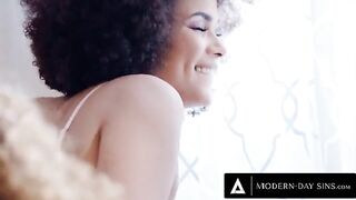 Two sexy babes, Scarlit Scandal and Alina Ali, share a big cock in an intense threesome