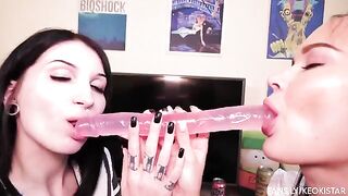 Two hot lesbians fuck each other with a double-ended dildo