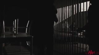 Two women, bound by a deep connection, share a passionate encounter behind bars