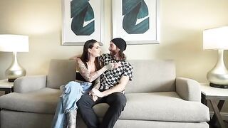 A sexy brunette girl gets her boyfriend's huge cock sucked by two girls