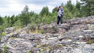 A hot chick is having sex directly on the stone in nature