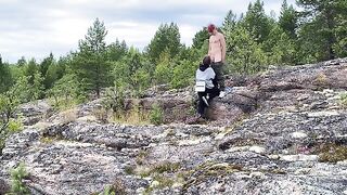 A hot chick is having sex directly on the stone in nature