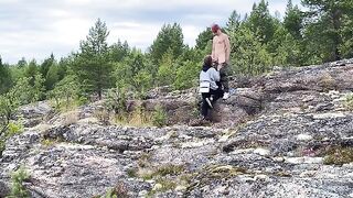 A hot chick is having sex directly on the stone in nature
