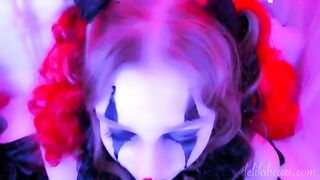 A kinky clown gets his dick sucked by a girl in a unique costume