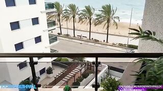 A couple has sex on the balcony while the sea splashes below