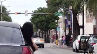 The young guy has fun with two girls in the car