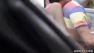 The young guy has fun with two girls in the car