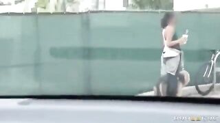The young guy has fun with two girls in the car