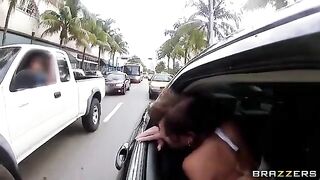 The young guy has fun with two girls in the car