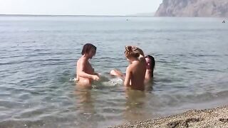 Three erporn girls on the public nudist beach