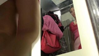 The peeping guy was caught spying in the locker room of the store