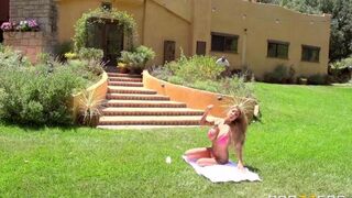 A couple have sex right on the grass lawn
