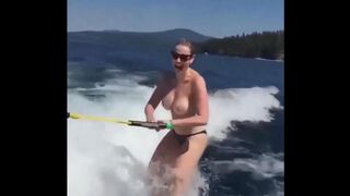 Topless girl water skiing is very attractive