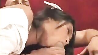 Hot Asian nurse fucks with a guy on the couch in her uniform