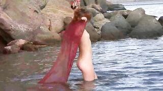 Nudist girl has small wet boobs, spank her