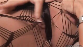 Two mature lesbians have their pussy licking session in stockings