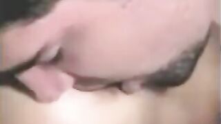 The guy fucked with a strapon, while another fingered him