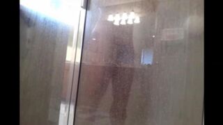 A man washes his body in the shower, but there’s a hidden camera