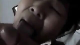 An appetizing Chinese woman practices her skills in giving a blowjob