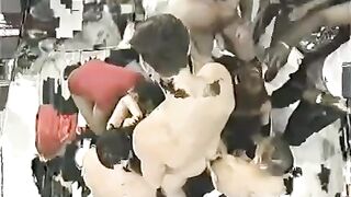 A crowd of guys fucked a pretty young girl with big tits
