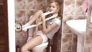A hot blonde has sex in the public toilet