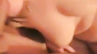 A girl with a big ass spreads her legs to show her boobs and pussy