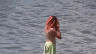 A nudist is walking on the coast of Crimea and gets excited