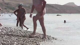 A nudist is walking on the coast of Crimea and gets excited