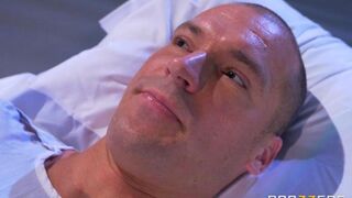 A nurse gave the patient her breast to suck in a hospital setting