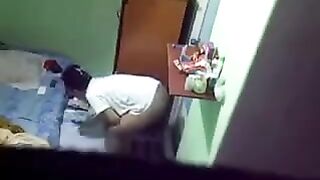 Camera hidden in the hostel room of a girl