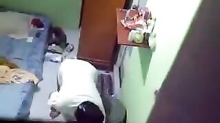 Camera hidden in the hostel room of a girl