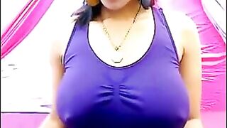 A girl is excited and her nipples are visible through her T-shirt