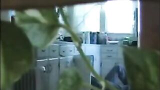 A married couple has fun on the naked walk around their apartment