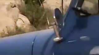 The driver guy is jerking off on the road with a babe